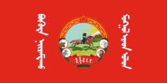 red, horseman emblem flanked by white Mongolian inscription
